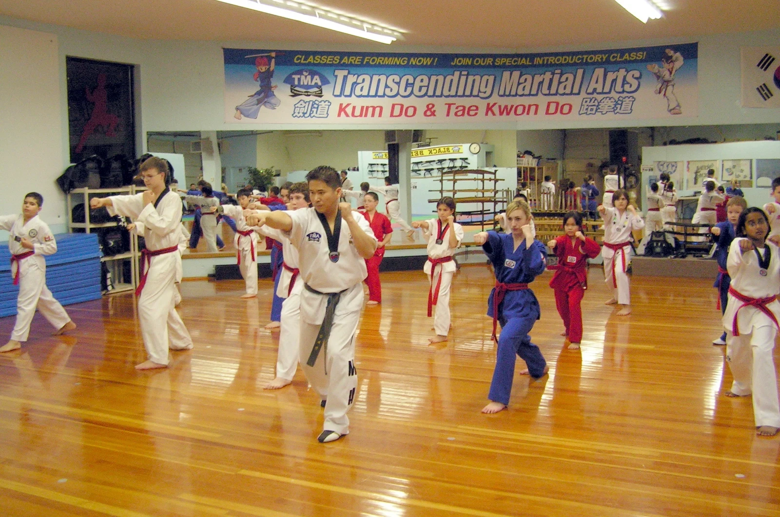 Kids learning sportsmanship through martial arts
